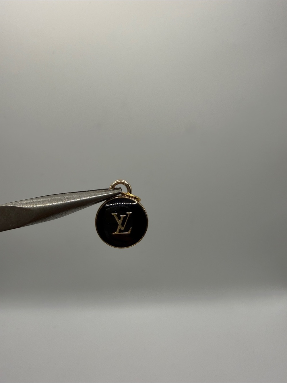 1499. Black and Gold Round Double Sided Charm Pendant
